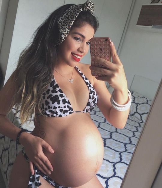 Latina Pregnant exudes a captivating and radiant beauty that is unparalleled.